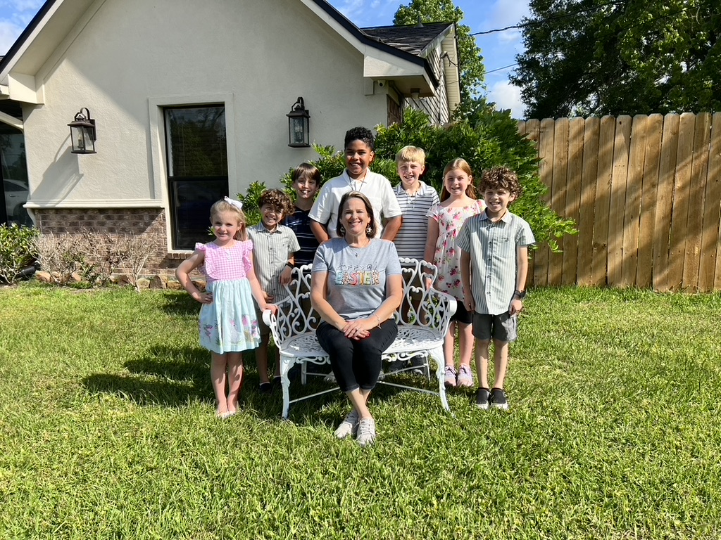 Angela Gilmer with her students in a backyard learning environment